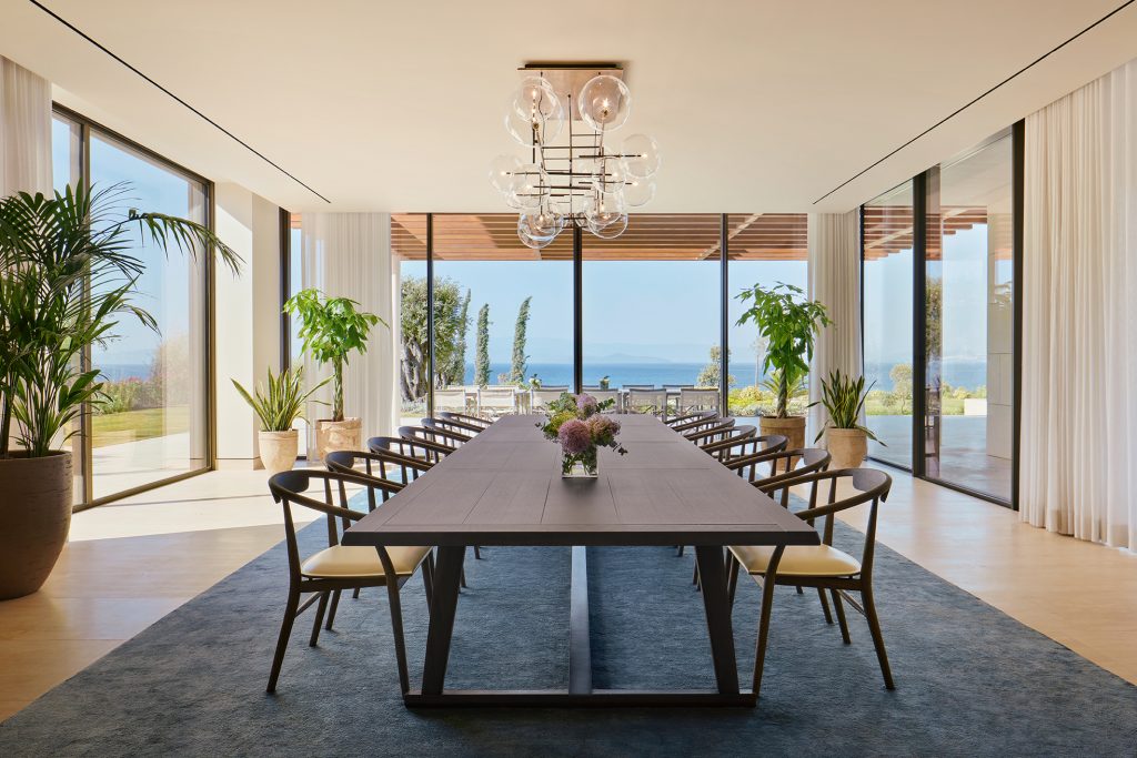 Interior Bulgari Bodrum's Mansion Dining Room that features 360 windows and views of the ocean.